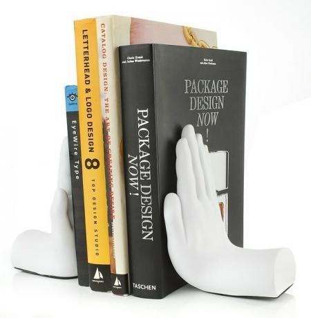 witte hand boekensteunen