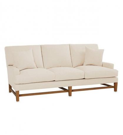 smėlio spalvos ekologiška sofa su medinėmis kojomis iš „Viva Terra“