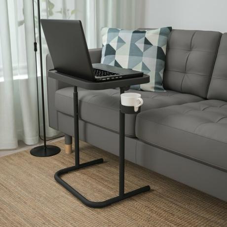 Supporto per laptop ikea Björkåsen antracite con laptop nero e tazza bianca