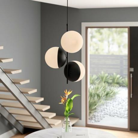 Iluminação contemporânea em preto e branco estilo globo para sala de jantar