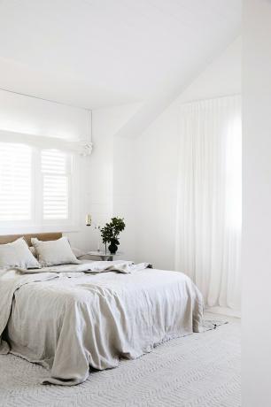 quarto com roupa de cama Cultiver na cama