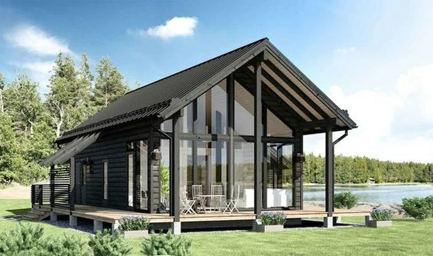 idéia de cabine moderna à beira do lago com janelas do chão ao teto