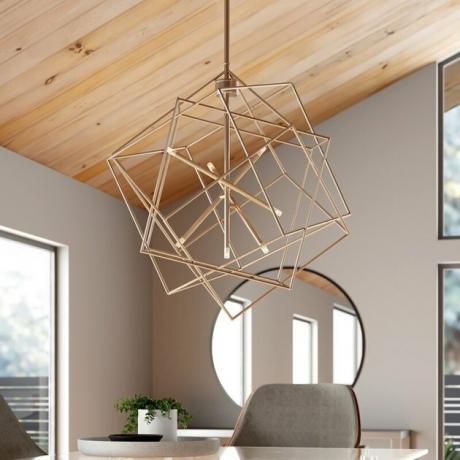 iluminação contemporânea da sala de jantar com formato geométrico e acabamento dourado