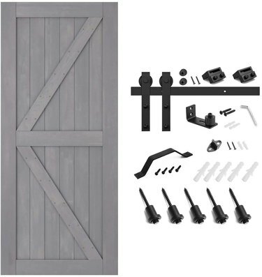 Un kit de instalare a ușii hambarului care arată instrumentele pentru șină, precum și ușa