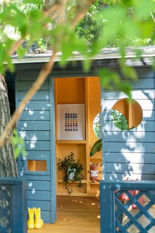Casa de brincar ao ar livre com armazenamento de brinquedos