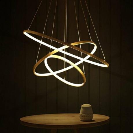 Iluminação de sala de jantar contemporânea em LED em camadas acima da mesa redonda