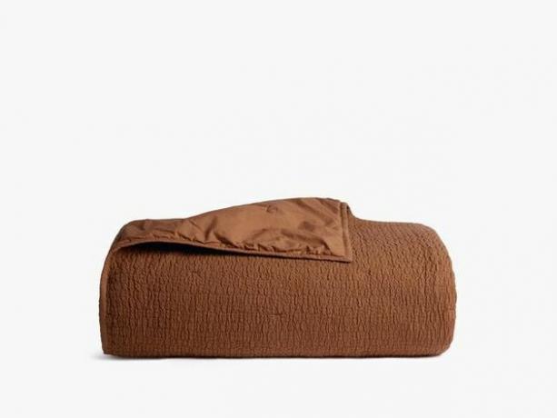 colcha texturizada de terracota