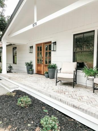 Casa de fazenda moderna externa com números de casas em estrutura A