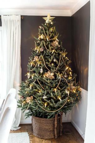 Kerstboom met gouden sterboomtopper Christmas Tree Topper Ideas