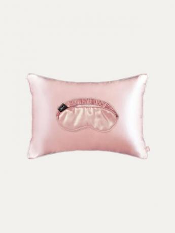 Almofada de seda rosa clara e máscara de viagem